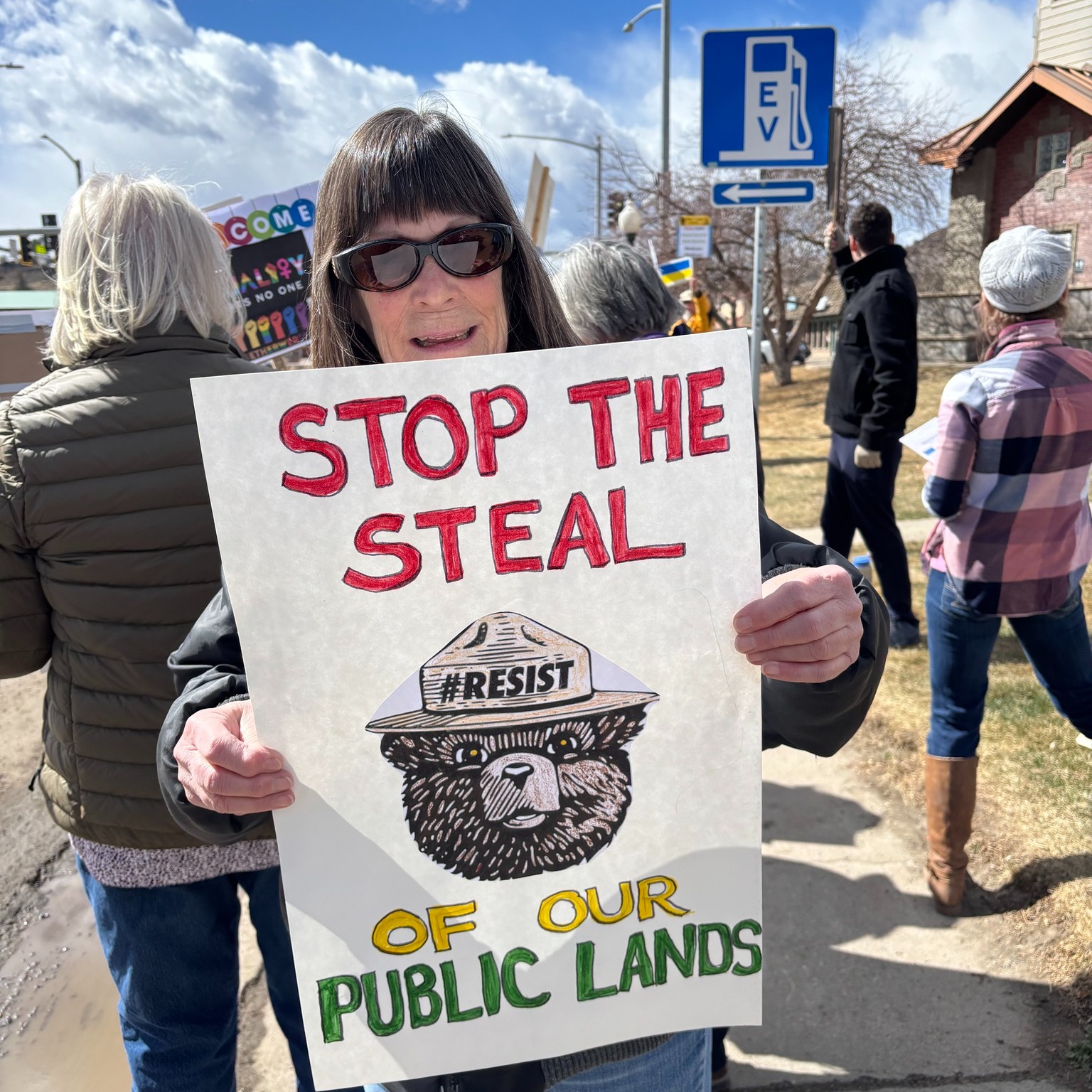 Protester holds sign saying Stop the Steal of our Public Lands 
