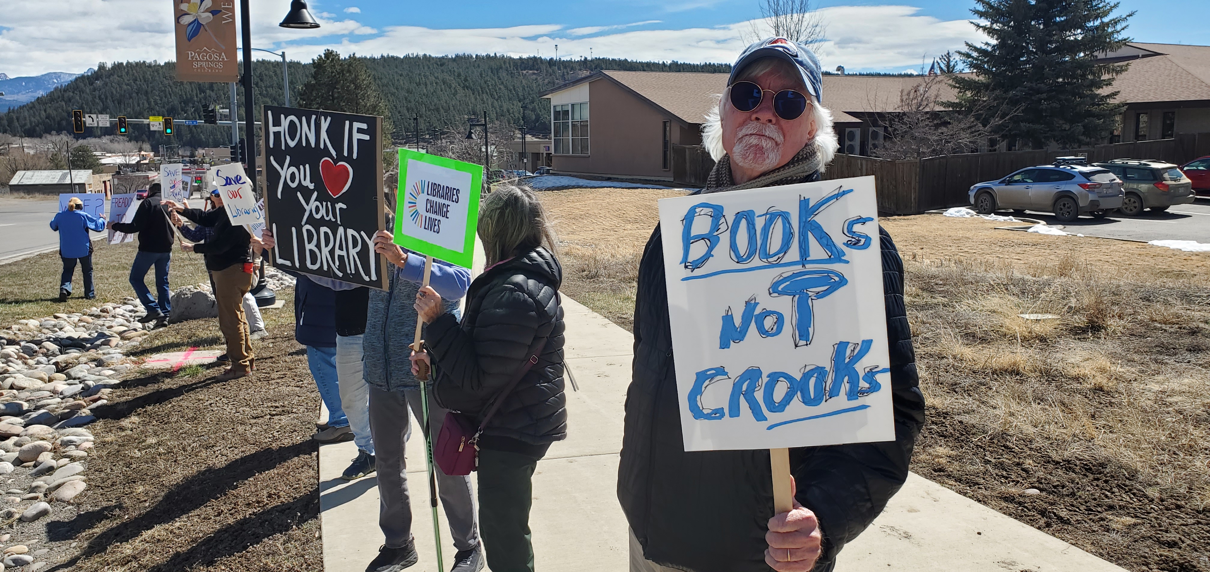 Crowd Rallies to Support Libraries